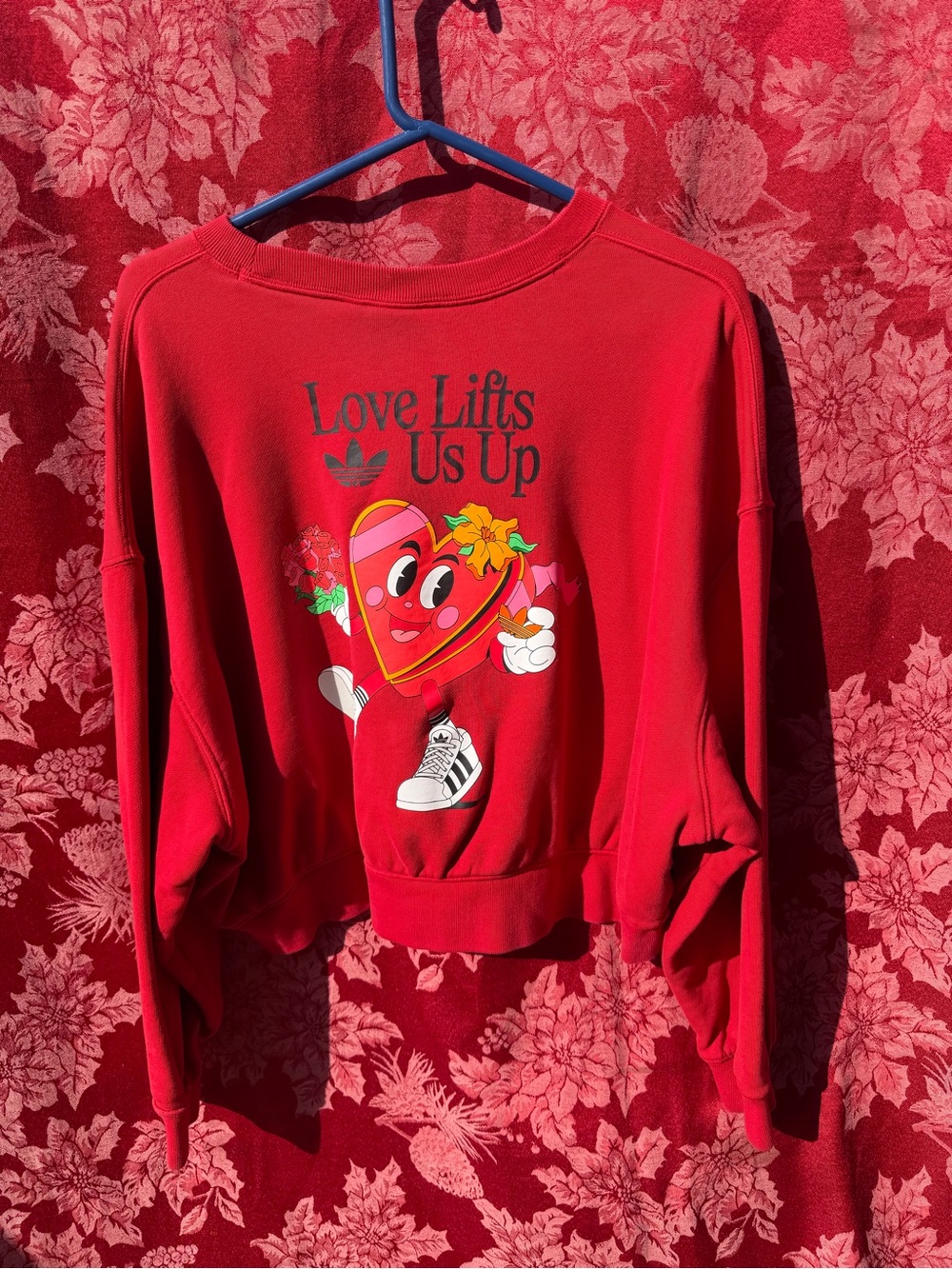 Adidas by Nelson cropped sweatshirt "Love Lifts Us Up"